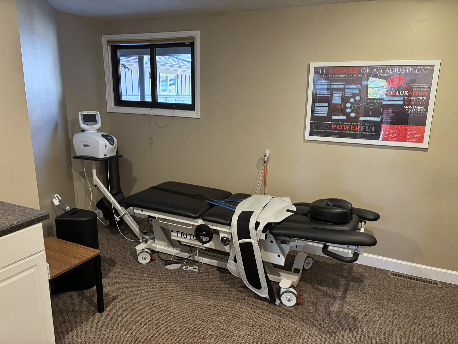 Triton spinal decompression table used for non-surgical disc care at our Kalamazoo clinic